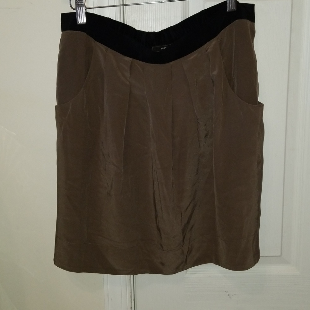 $5 ITEM. BCBG Maxazria dusty olive skirt. MUST BUNDLE WITH TWO OTHER ITEMS